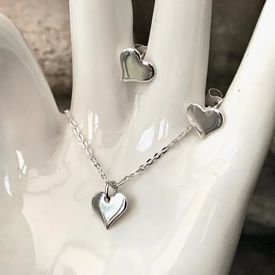 Dainty Silver heart stud earrings.